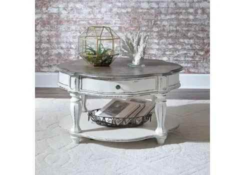 104675-liberty-furniture-magnolia-manor-antique-white-1-drawer-round-cocktail-table-38-1.webp