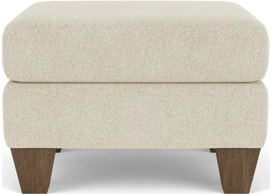 Flexsteel Moxy Shell Ottoman with Medium Brown Legs