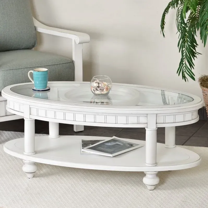 107178-seawinds-monaco-oval-coffee-table-with-pelican-insert-blanc-finish-46-1.webp