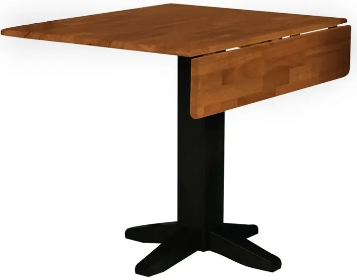 113594-john-thomas-dining-essentials-square-drop-leaf-pedestal-table-in-black-cherry-36-1.webp