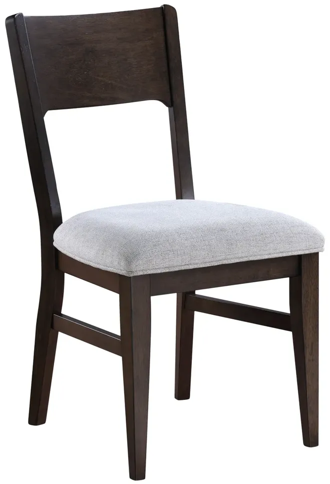 14006-bryndis-wood-panel-back-chair-1.webp