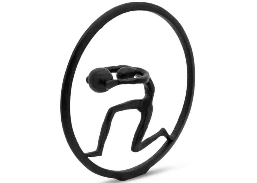 Man With Ball Sculpture