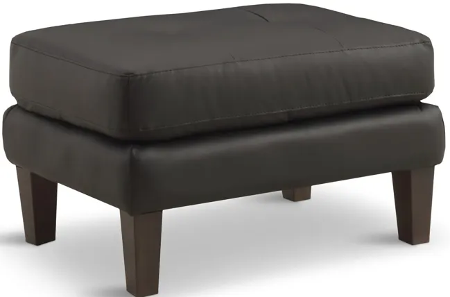 2083-whinny-leather-ottoman-1.webp