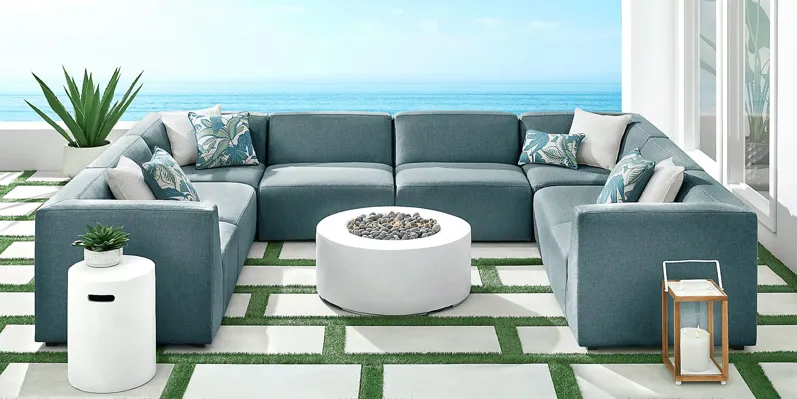 21546-calay-8-pc-outdoor-sectional-with-teal-slipcovers-144-1.webp