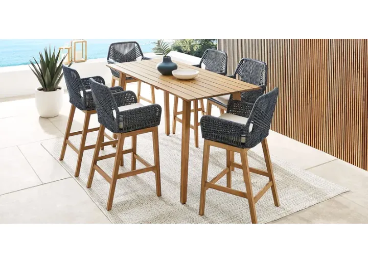 26378-tessere-natural-7-pc-bar-height-outdoor-dining-set-with-blue-barstools-1.webp