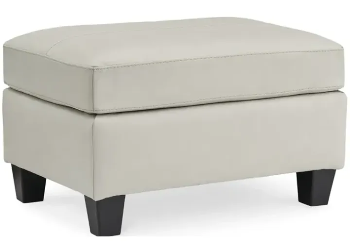 4679-merida-leather-ottoman-coconut-1.webp