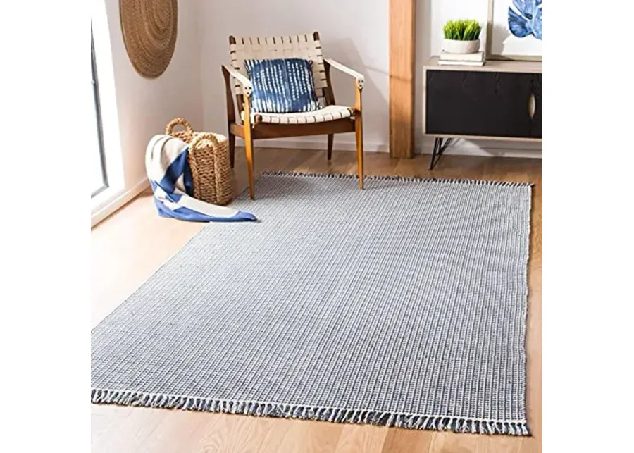 SAFAVIEH Montauk Collection Area Rug - 5' x 8', Ivory & Navy, Handmade Flat Weave Boho Farmhouse Cotton Tassel Fringe, Ideal for High Traffic Areas in Living Room, Bedroom (MTK340B)-60