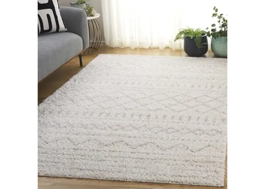 62238-safavieh-arizona-shag-collection-area-rug-5-1-x-7-6-ivory-beige-1.webp
