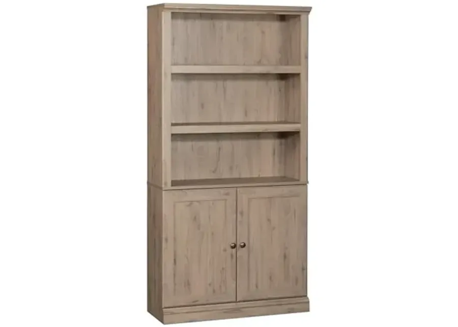 Sauder Miscellaneous Storage 5-Shelf Bookcase with Doors, L: 35.28" x W: 13.23" x H: 69.76-Laurel Oak Finish 1 64915-sauder-miscellaneous-storage-5-shelf-bookcase-with-doors-l-35-28-x-w-13-23-x-h-69-76-laurel-oak-finish-1.webp