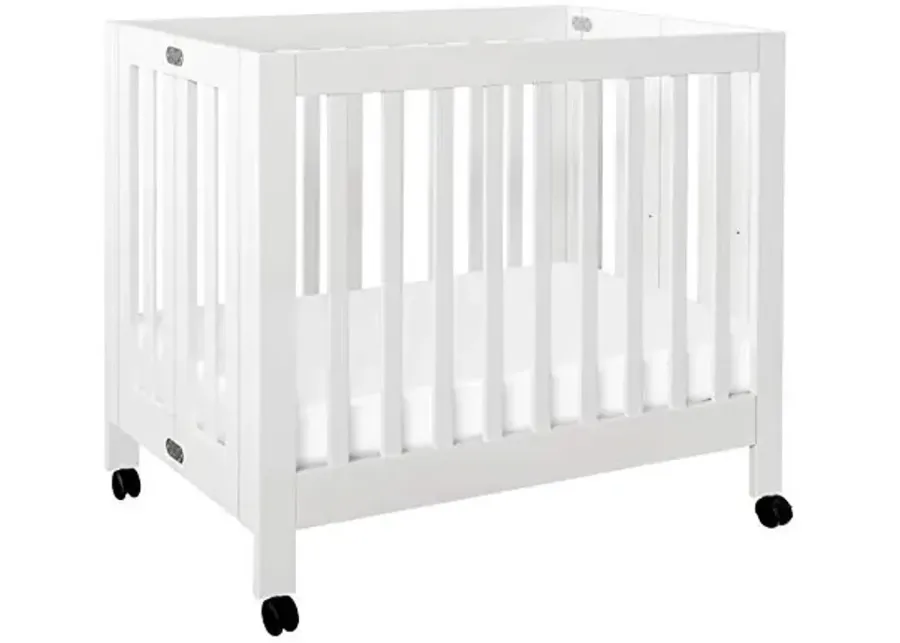 Babyletto Origami Mini Portable Crib Folding with Wheels in White, 2 Adjustable Mattress Positions, Greenguard Gold Certified-White 1 71119-babyletto-origami-mini-portable-crib-folding-with-wheels-in-white-2-adjustable-mattress-positions-greenguard-gold-certified-white-1.webp