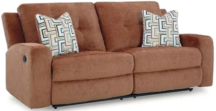71269-signature-design-by-ashley-danum-contemporary-tufted-manual-reclining-sofa-with-2-accent-pillows-orange-orange-1.webp