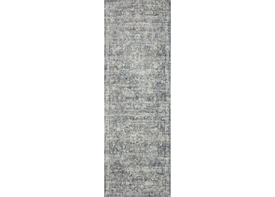 8770-theory-ivory-blue-area-rug-2-7-x-10-10–1.webp