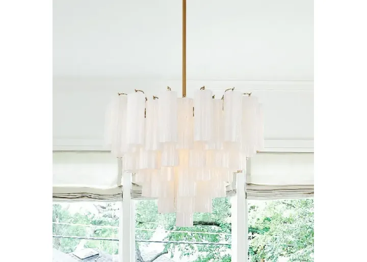 88808-addis-26-3-4-w-aged-brass-12-light-chandelier-w-white-glass-gold-1.webp