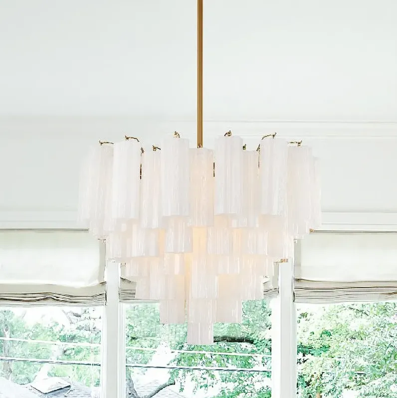 88808-addis-26-3-4-w-aged-brass-12-light-chandelier-w-white-glass-gold-1.webp