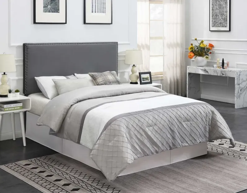 99554-steve-silver-bergen-queen-gray-velvet-upholstered-headboard-with-nailhead-trim-64-25-1.webp